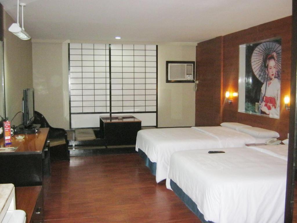 Hotel Sogo Malate Манила Номер фото